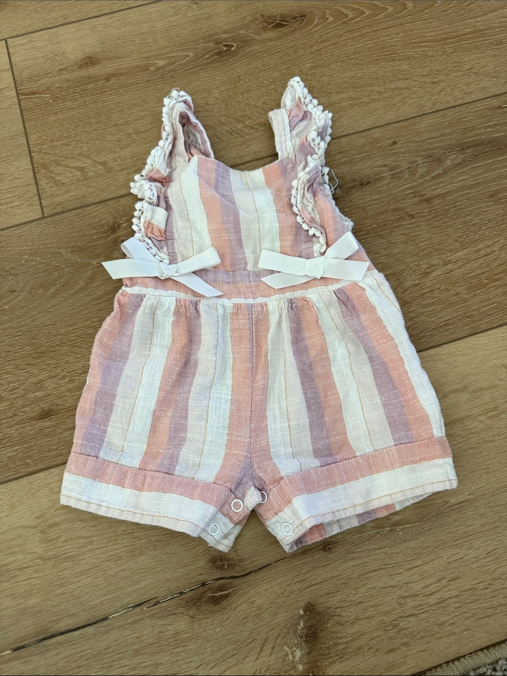 Rare Editions Pink Cream and Lavender Striped Romper with Bow Accents